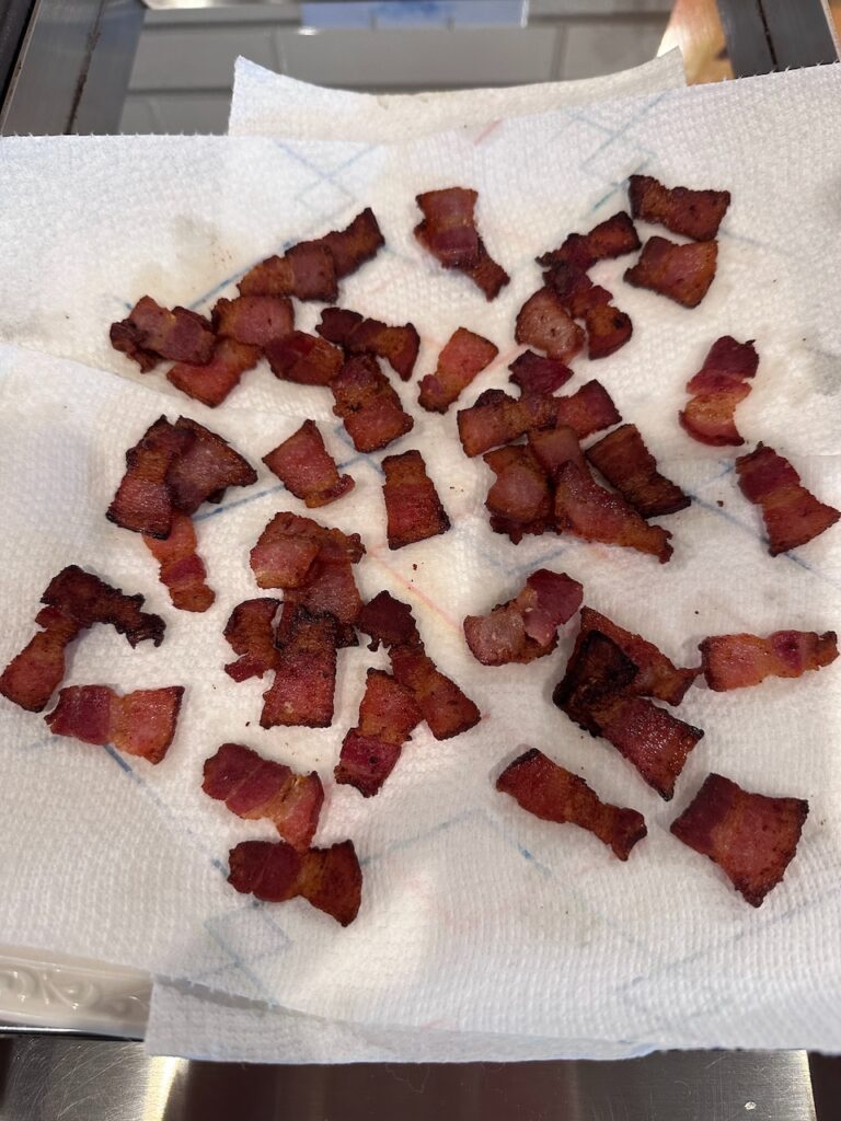 Draining bacon lardons on paper towels