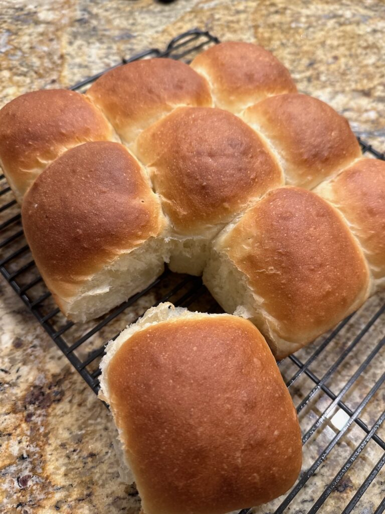 homemade buns shown as a great option for a side dish to this creamy chicken or turkey wild rice soup