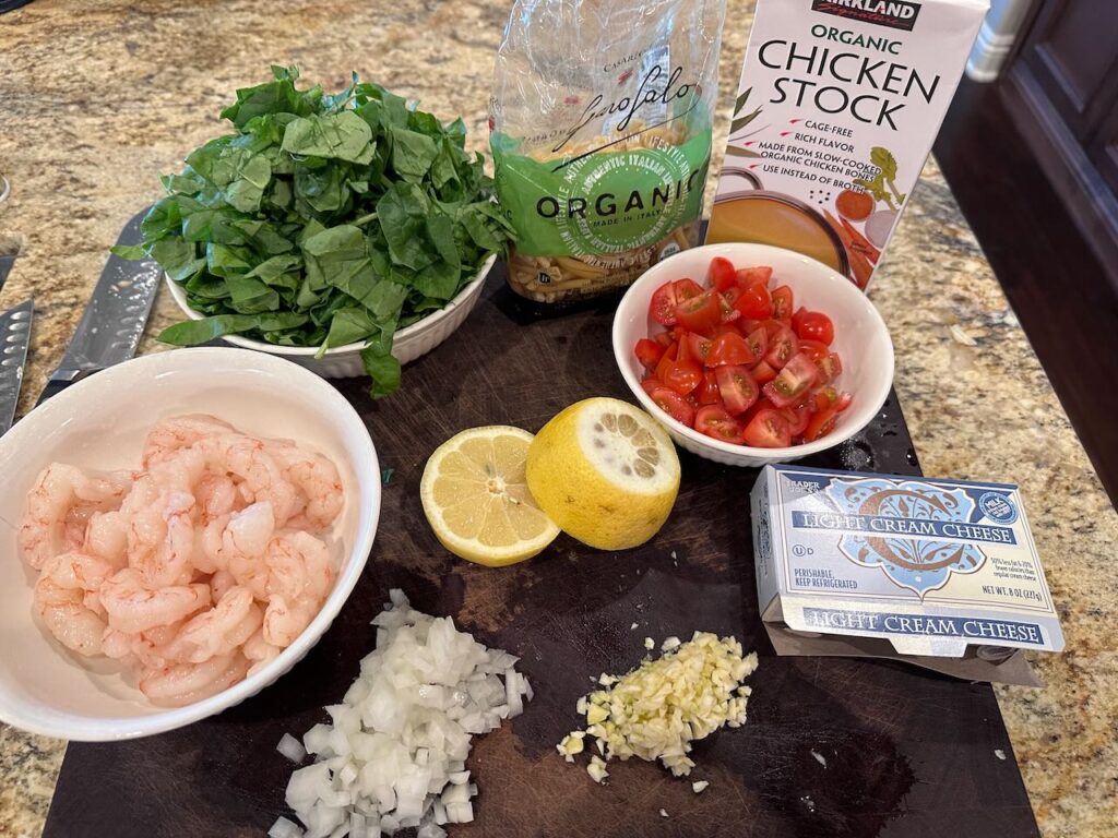 Ingredients for pasta with lemon shrimp and garlic.  I also included tomatoes and spinach to beef up the veg content! 