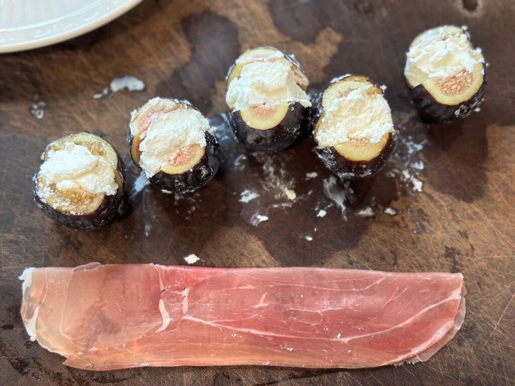 Preparing prosciutto for wrapping around figs