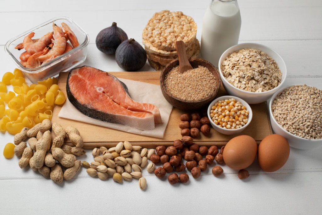 Picture of food items that have protein - fish, eggs, nuts, oatmeal etc.