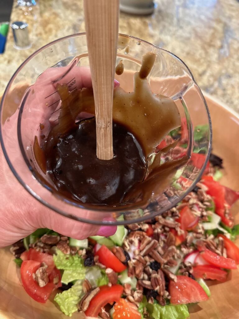 Another view of balsamic dressing and the salad 