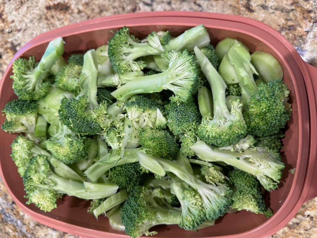 My old old old steaming basket with broccoli in it - ready for steeped garlic and butter 