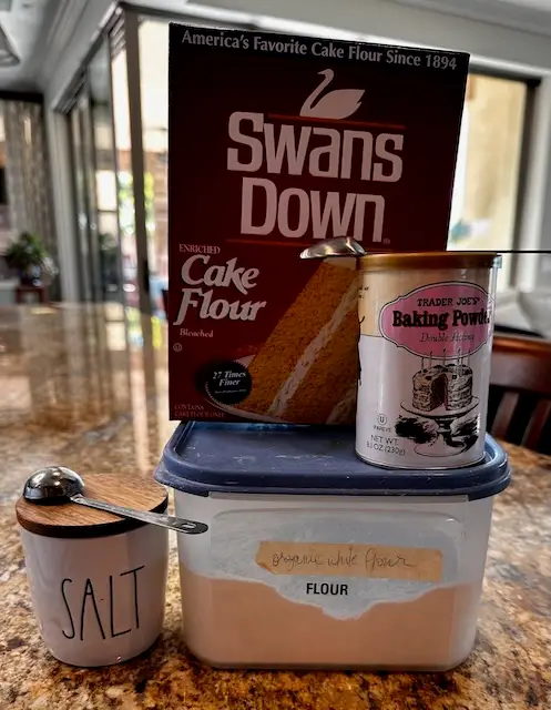picture of ingredients ready to make pie dough - salt, AP flour, baking powder and cake flour
