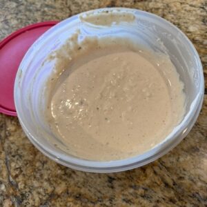 A lonely bowl of excellent creamy thick and delicious caesar salad dressing