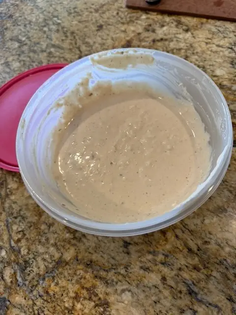 A lonely bowl of excellent creamy thick and delicious caesar salad dressing