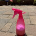 Pink Spray bottle with homemade weed killer